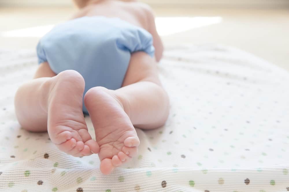 baby in organic cloth diaper