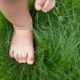 closeup of baby feet in grass