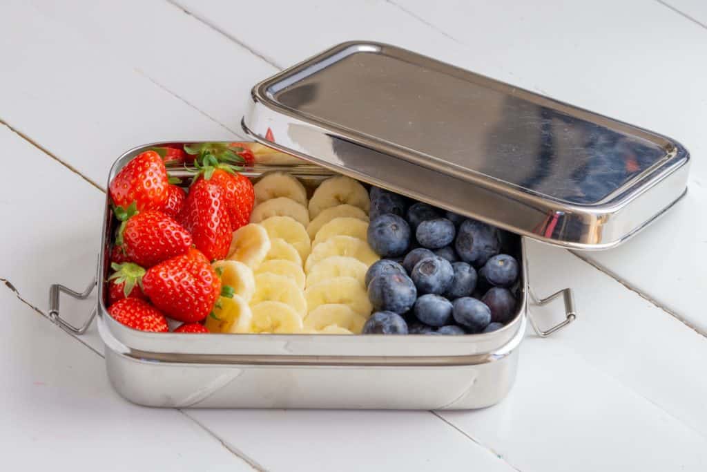 picture of stainless steel lunch box with fruit inside