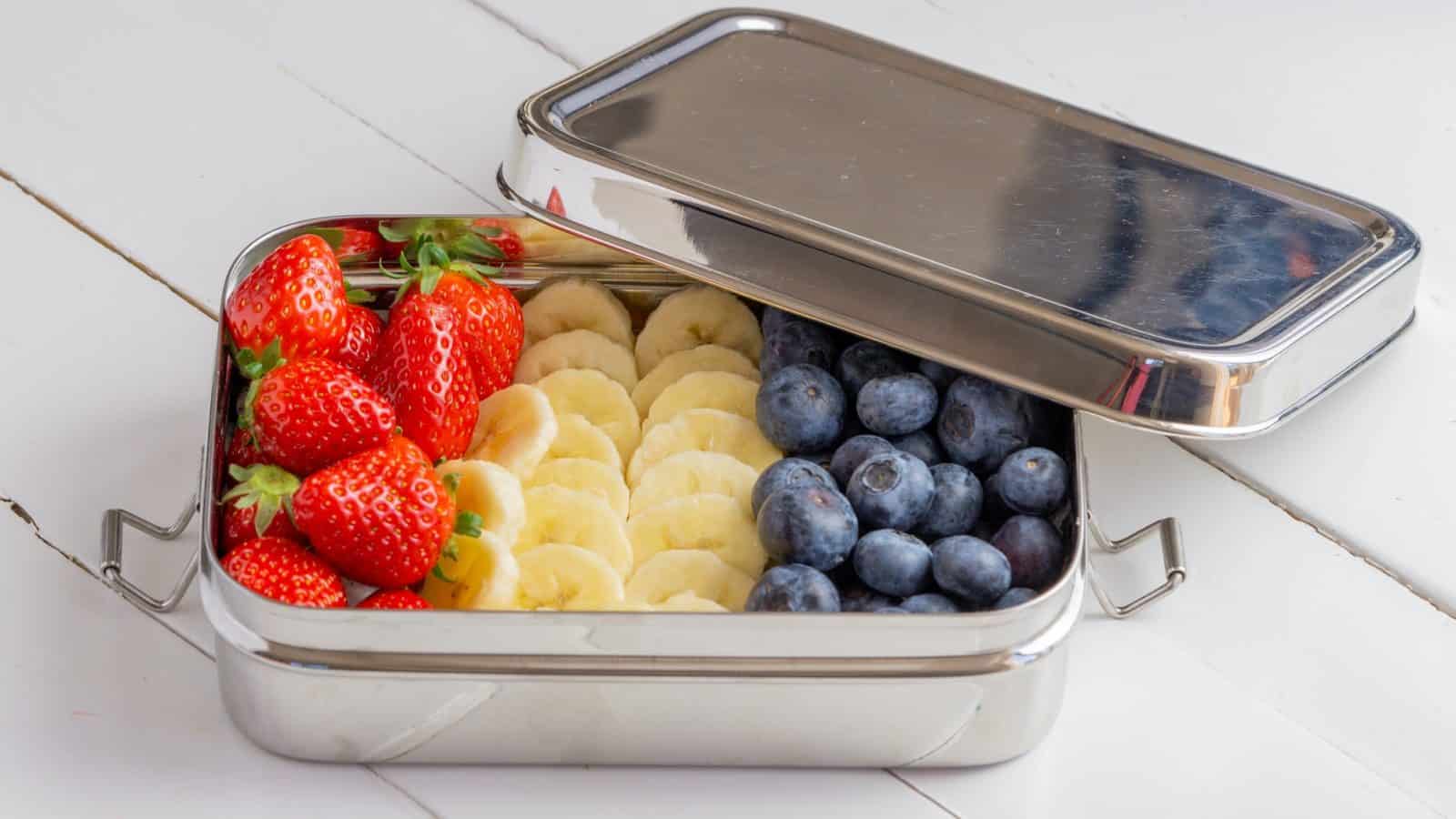 picture of stainless steel lunch box with fruit inside