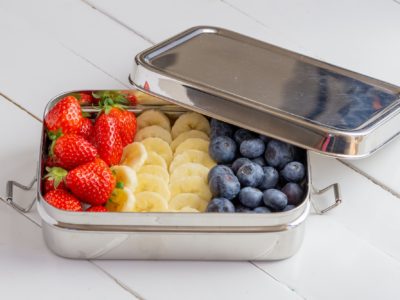 picture of stainless steel lunch box with fruit inside