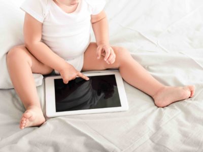 toddler using tablet
