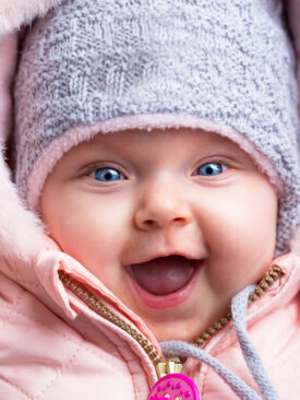 closeup of baby in puffy winter coat with perfluorinated chemicals