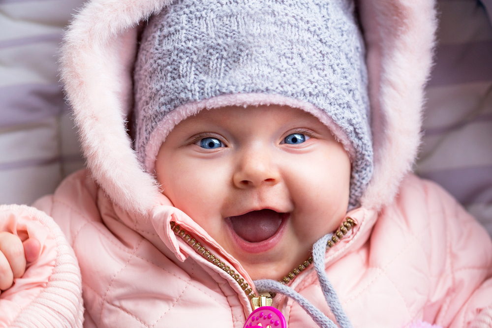 closeup of baby in puffy winter coat with perfluorinated chemicals